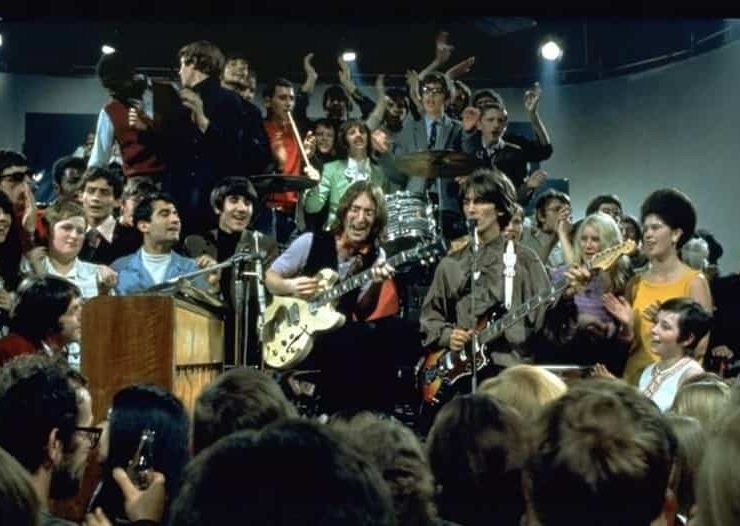 The Beatles performing "Hey Jude" live on stage