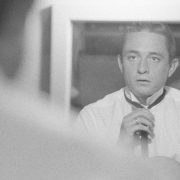 Johnny Cash, a legendary figure in country music, contributes to the genre's evolution with his timeless songs and cultural influence